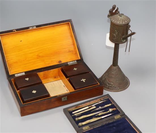 A card box, drawing instruments and a brass coffee pot